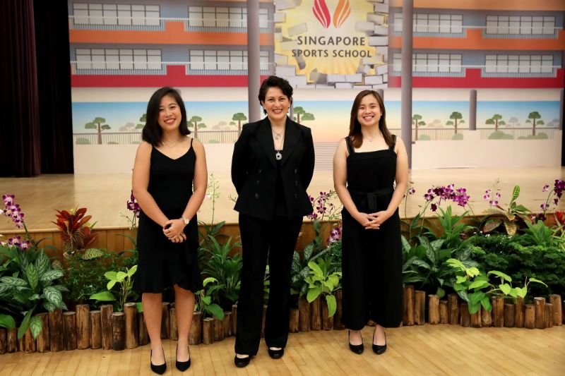 Award recipients Au Yeong Wai Yhann left and Eunice Lim with Ms Vanessa Ess centre.jpg